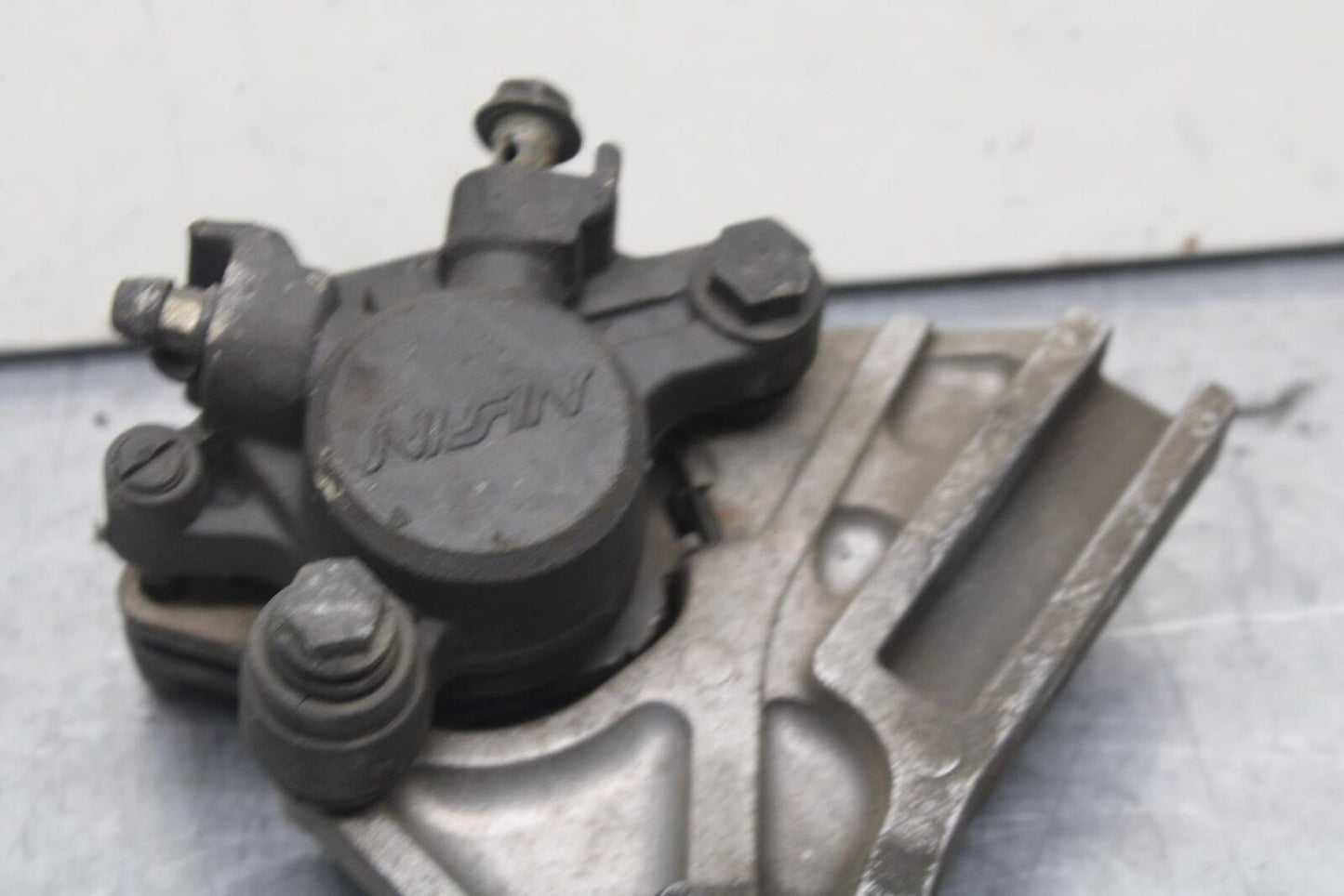 2003 Suzuki SV1000S REAR BACK BRAKE CALIPER W MOUNT BRACKET BB85