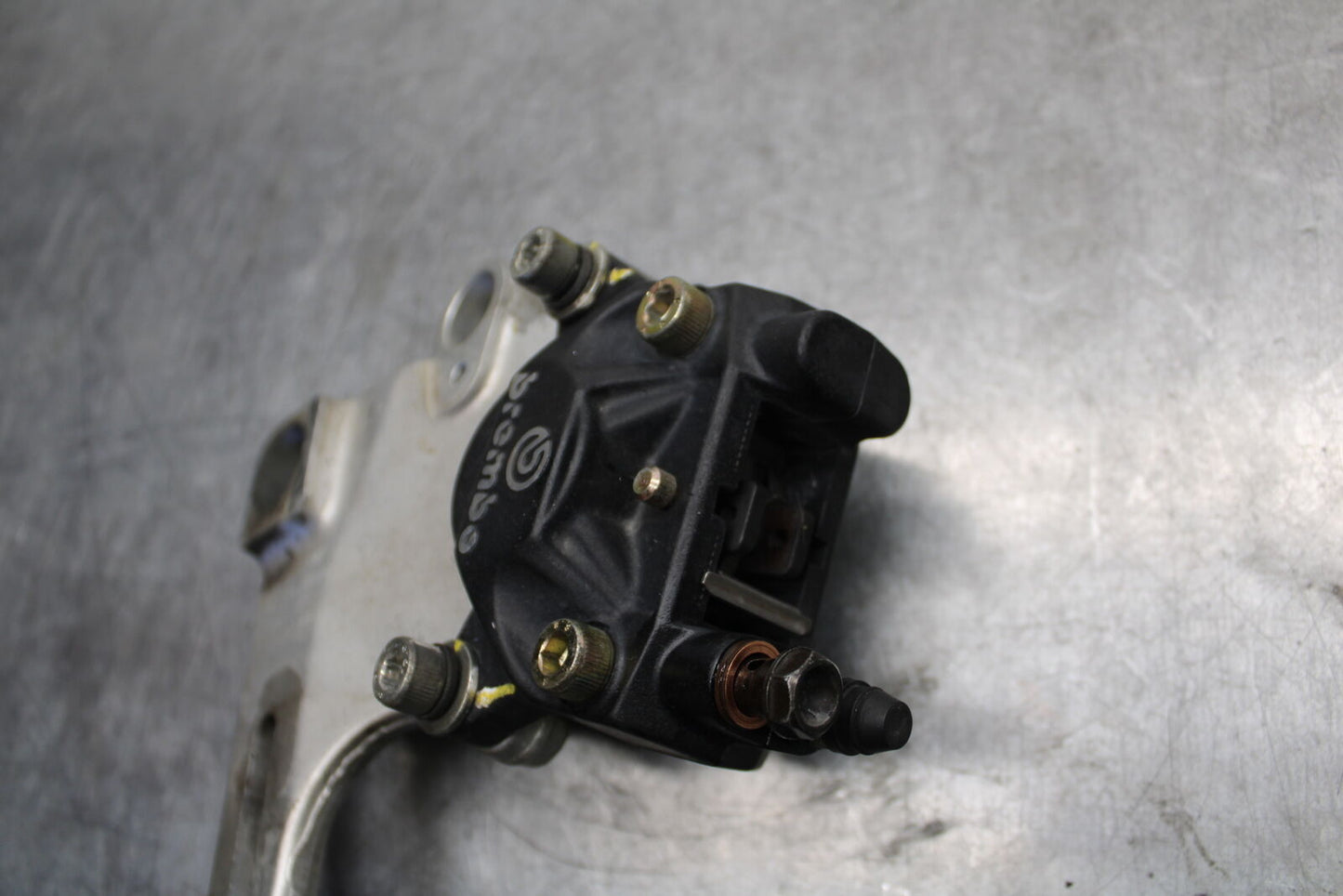 06-07 DUCATI MONSTER 695 REAR BACK BRAKE CALIPER W MOUNT BRACKET BB674