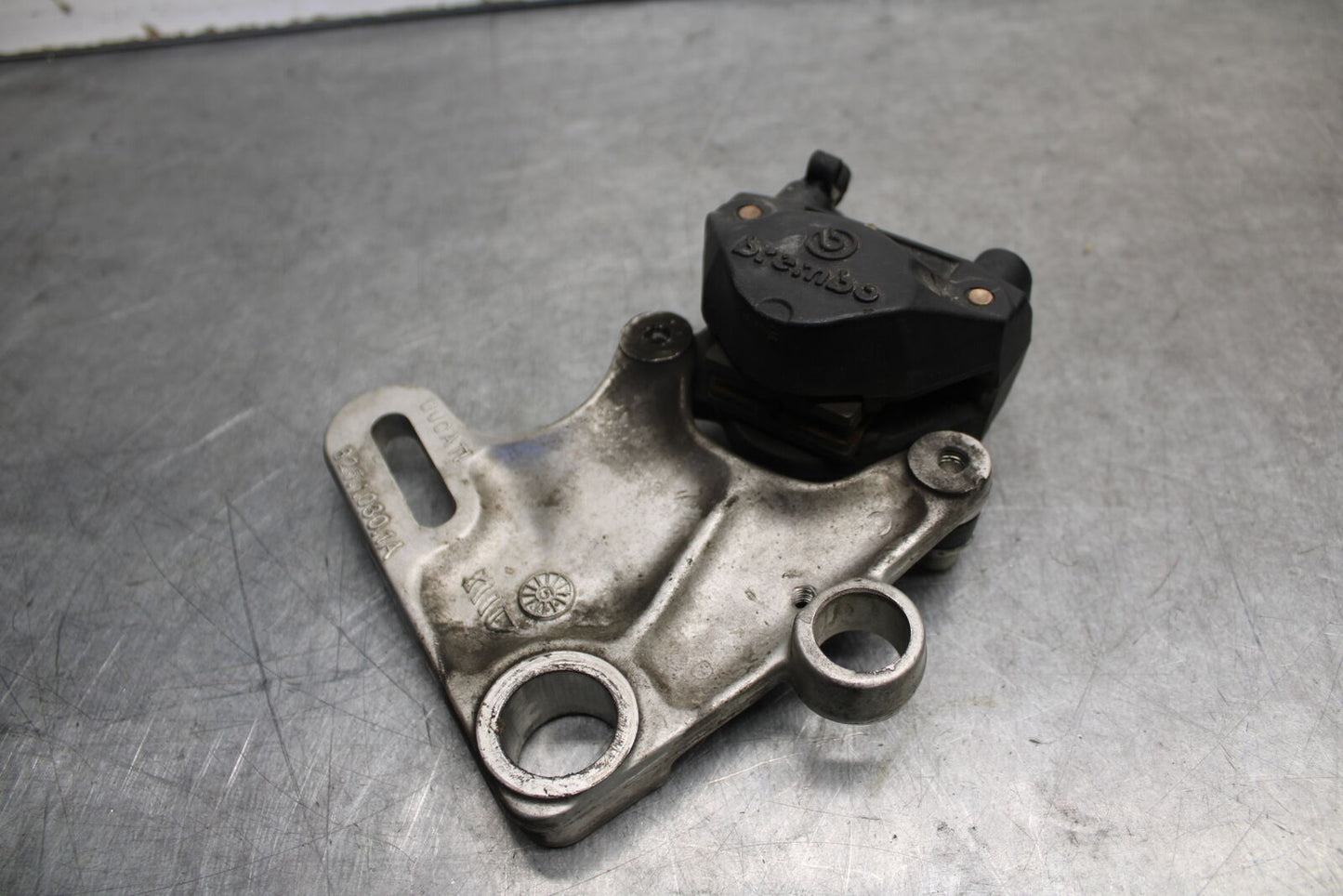 06-07 DUCATI MONSTER 695 REAR BACK BRAKE CALIPER W MOUNT BRACKET BB674