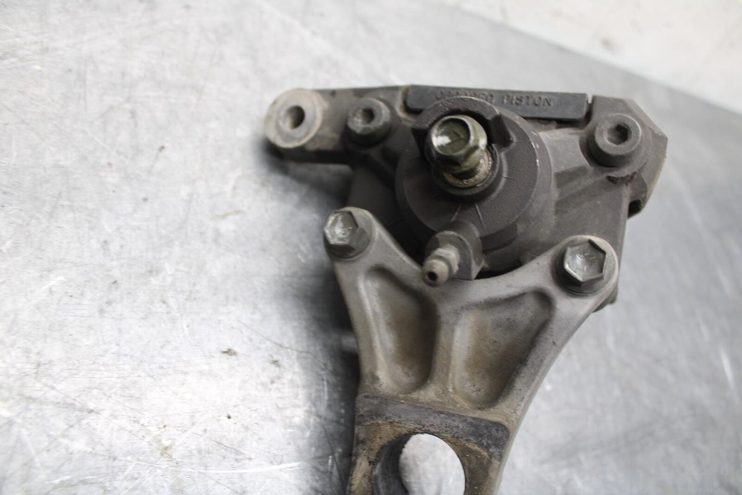 1998 Suzuki TL1000S REAR BACK BRAKE CALIPER W MOUNT BRACKET BB508