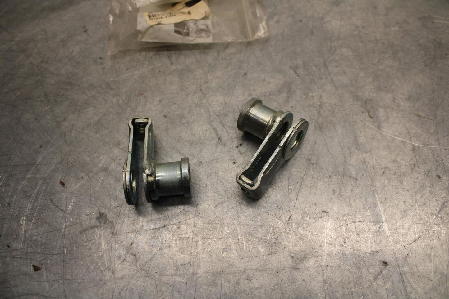 1978 Suzuki PE175 SWINGARM CHAIN TENSIONER BRACKETS 61410-41500 BB33