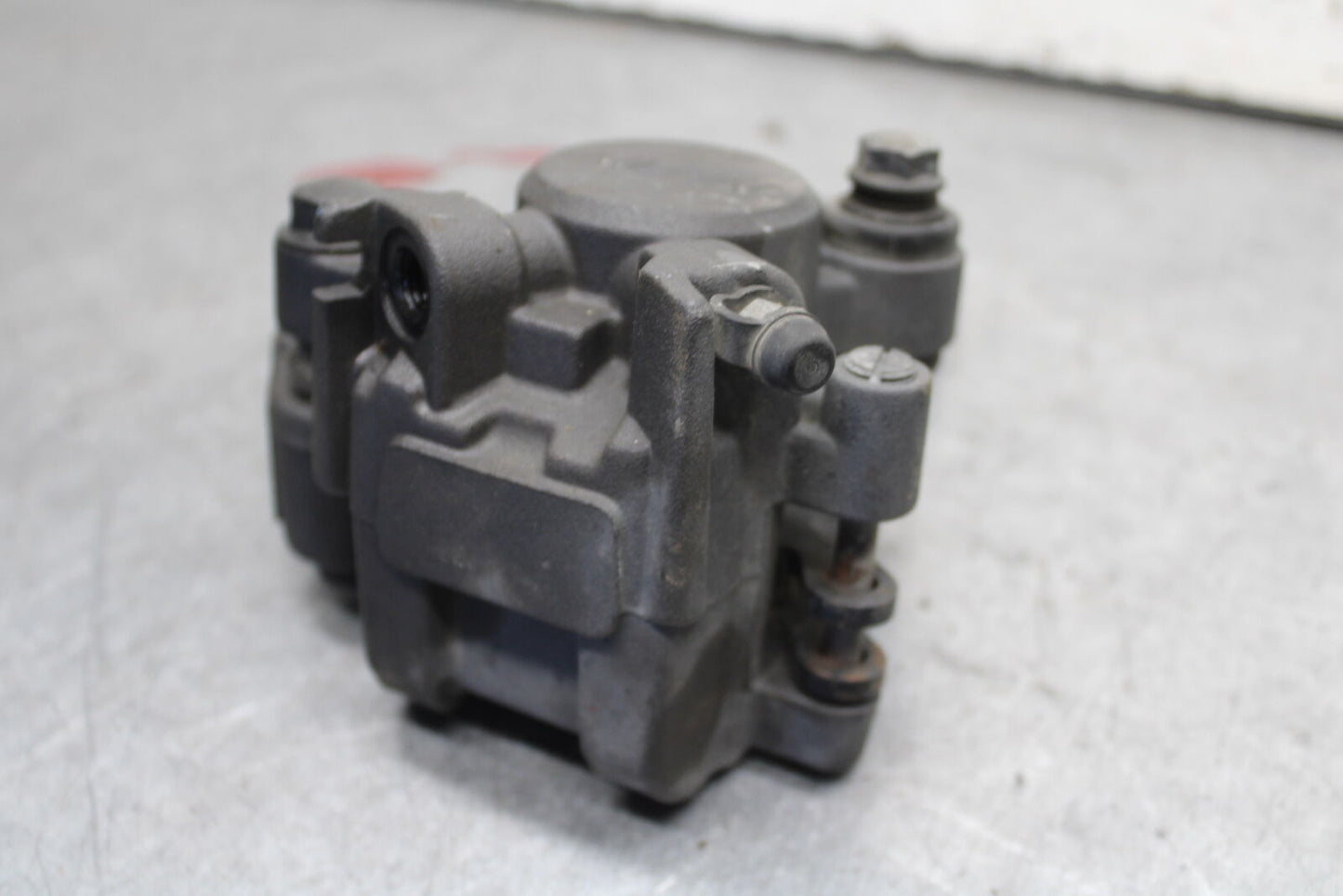 09-11 TRIUMPH DAYTONA 675 REAR BACK BRAKE CALIPER W MOUNT BRACKET BB652