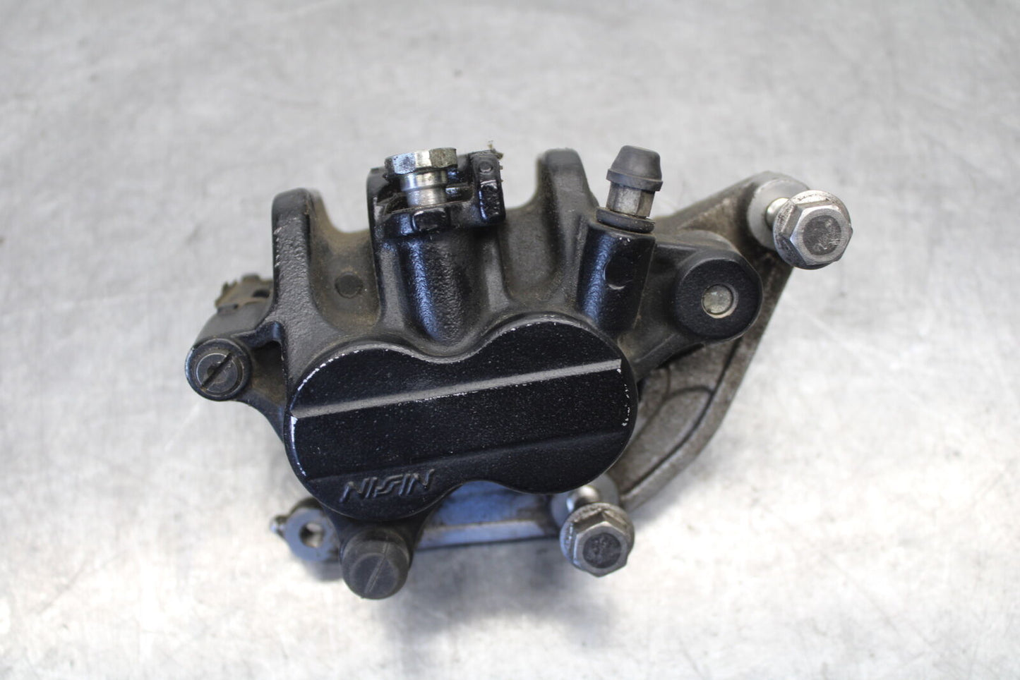 01-06 TRIUMPH TIGER 955I REAR BACK BRAKE CALIPER W MOUNT BRACKET BB693