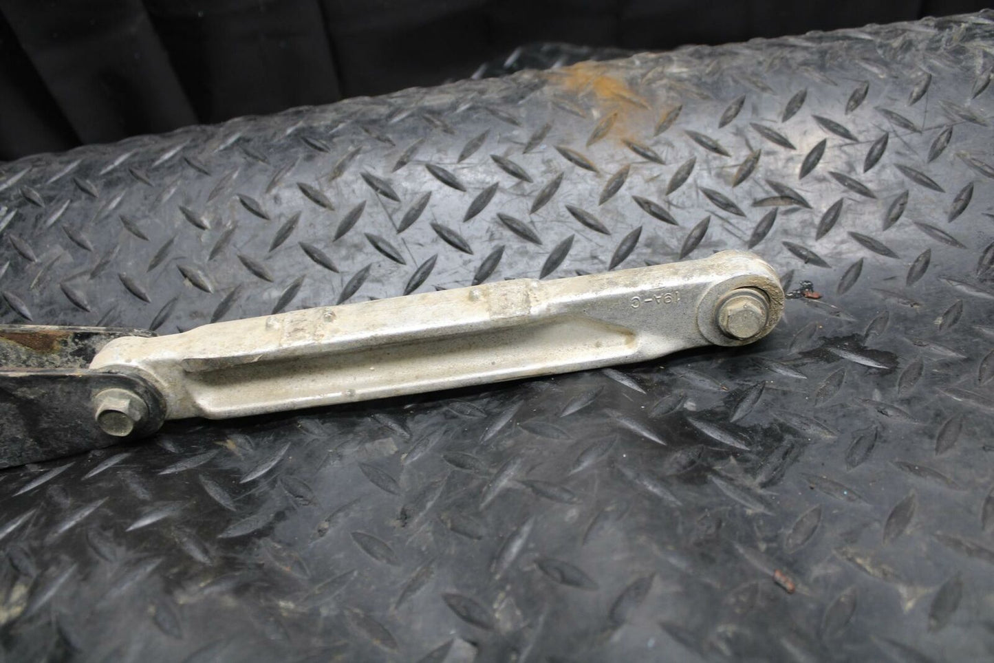 85-86 SUZUKI QUADRACER 250 REAR DOGBONE SHOCK LINKAGE LINK BB210