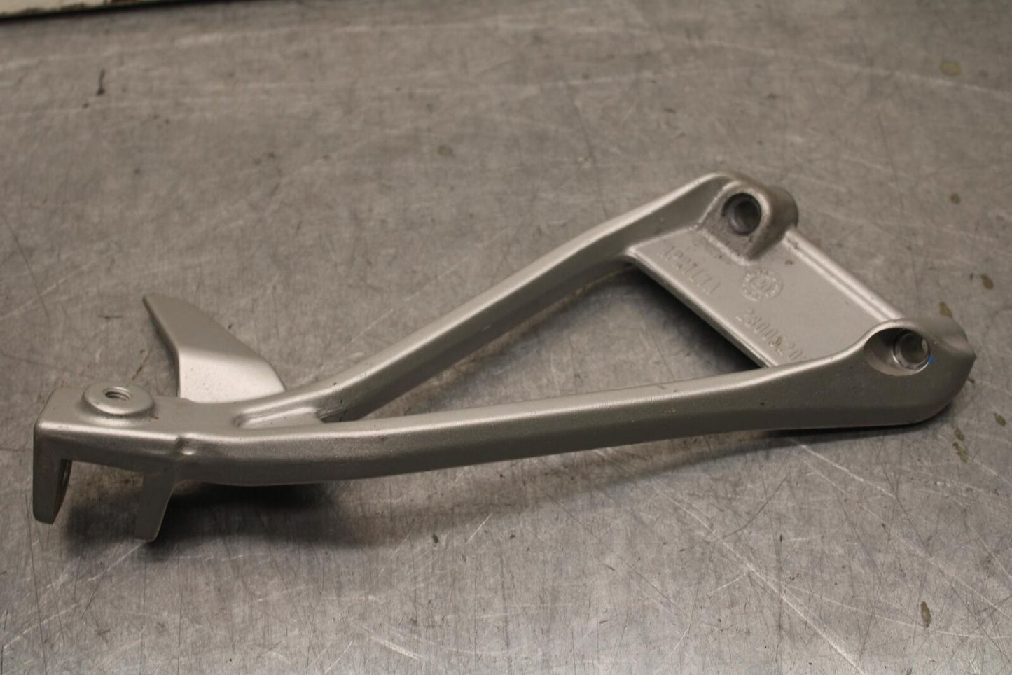 20-23 APRILIA RS660 LEFT PASSENGER FOOT PEG BRACKET MOUNT BB643