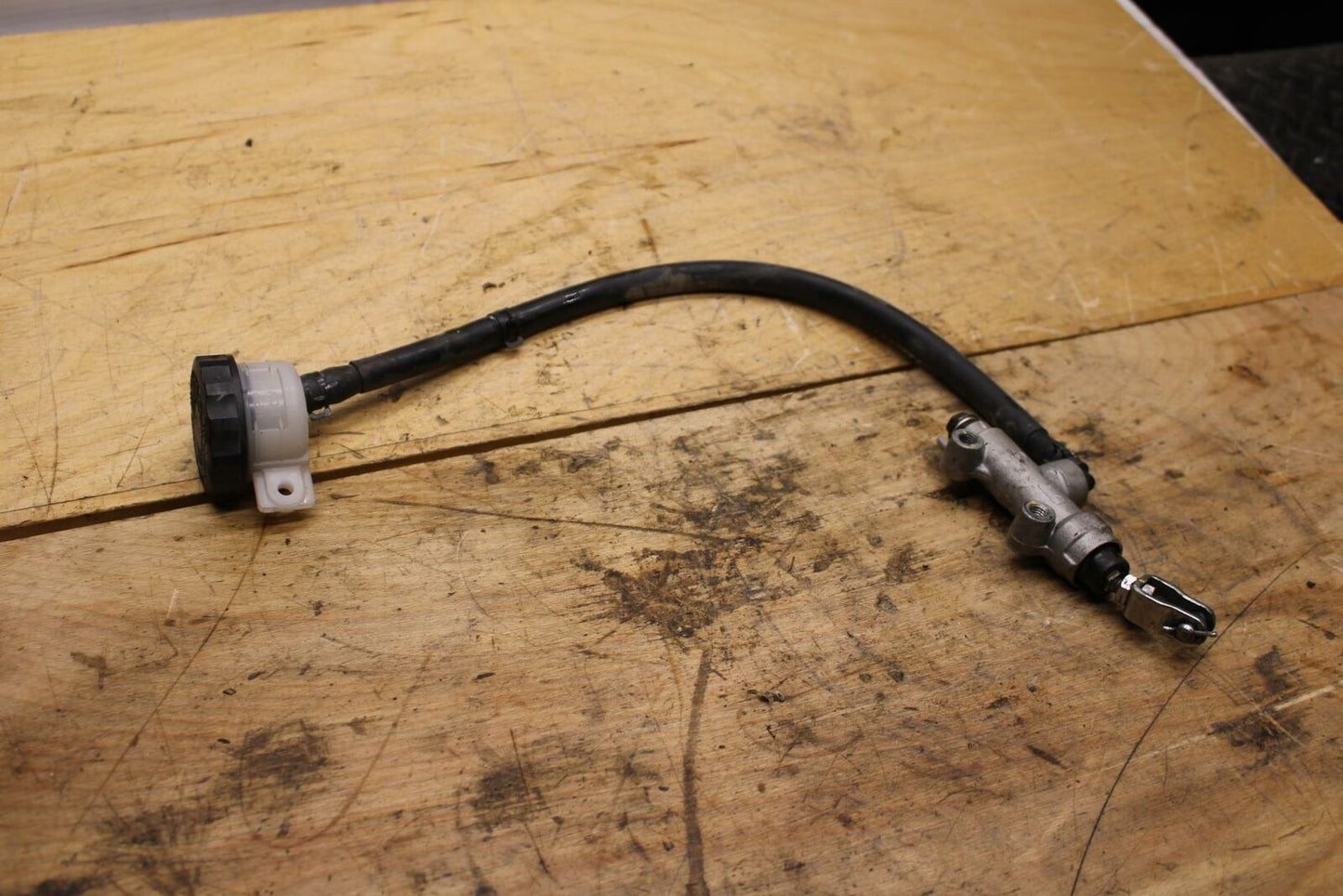 09-10 KAWASAKI ER-6N REAR BACK BRAKE MASTER CYLINDER W RESERVOIR BENT BB325