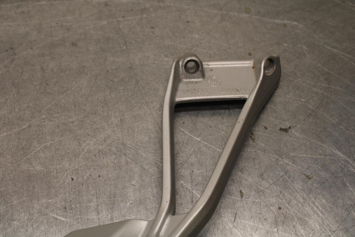 20-23 APRILIA RS660 LEFT PASSENGER FOOT PEG BRACKET MOUNT BB643