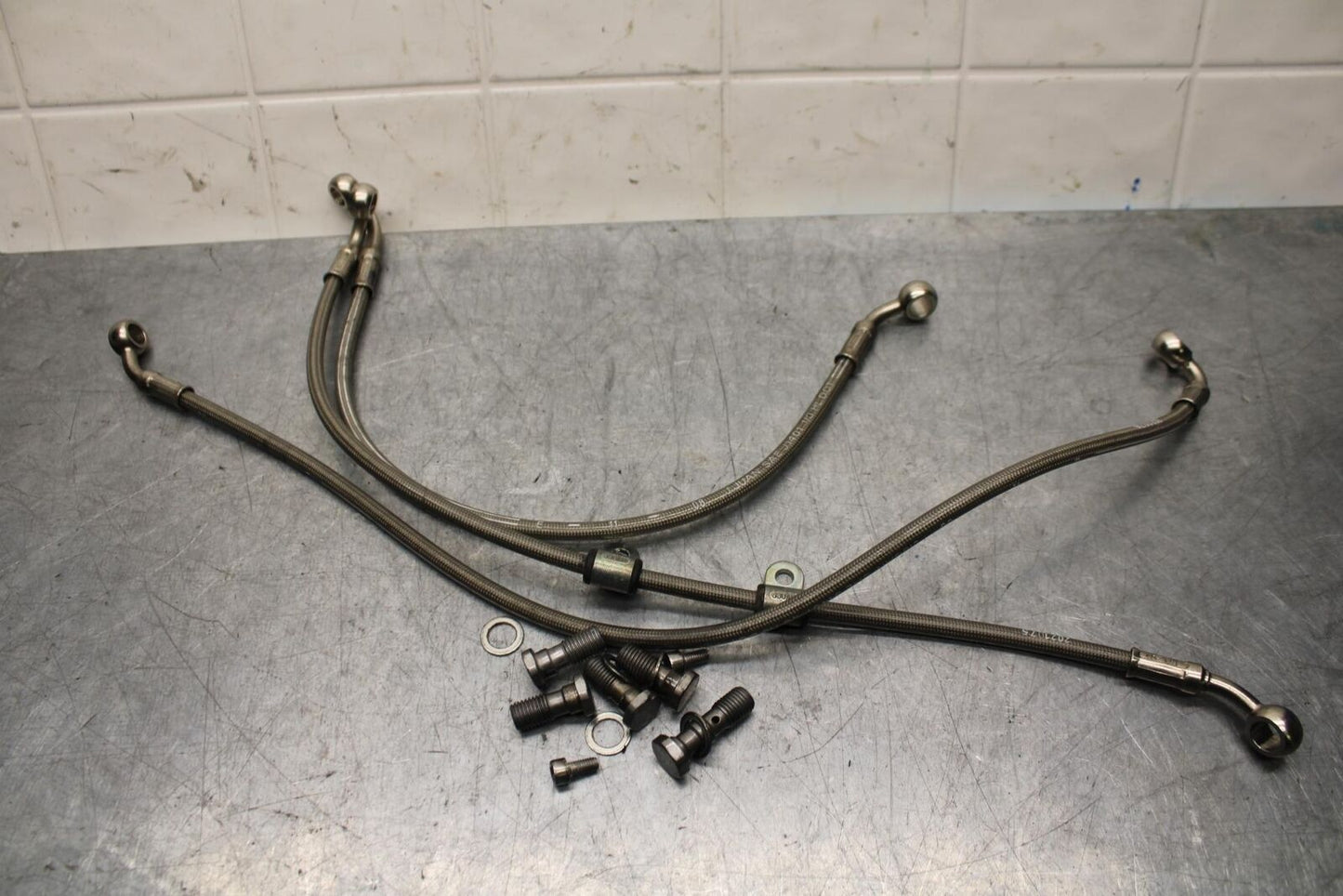 2009 Triumph Daytona 675 FRONT BRAKE CALIPER HOSES LINES BB584