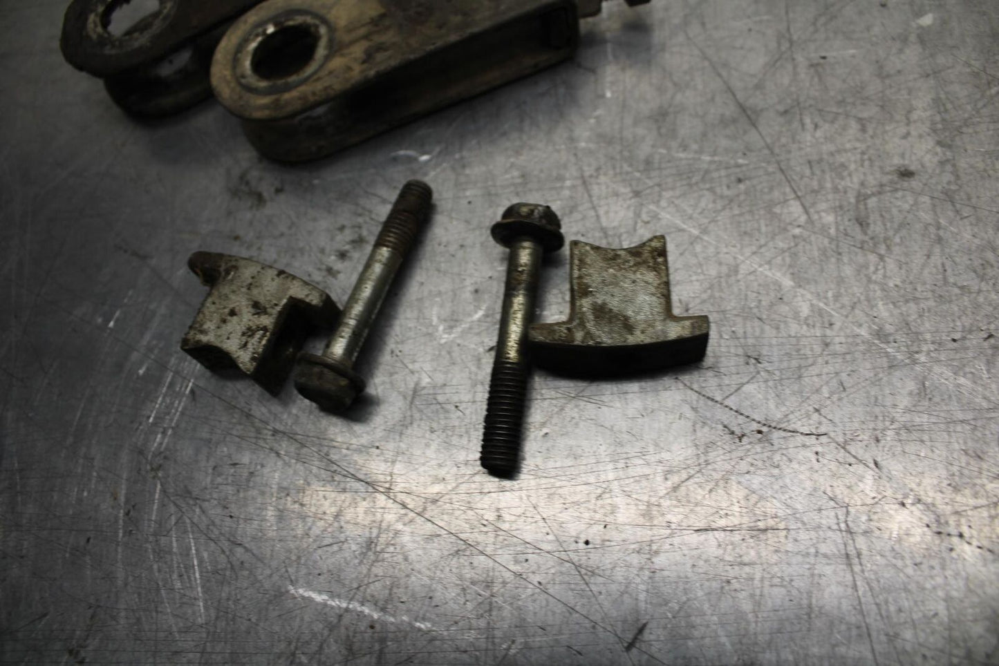 75 SUZUKI GT 550 SWINGARM CHAIN TENSIONER ADJUSTMENT BRACKETS BB72