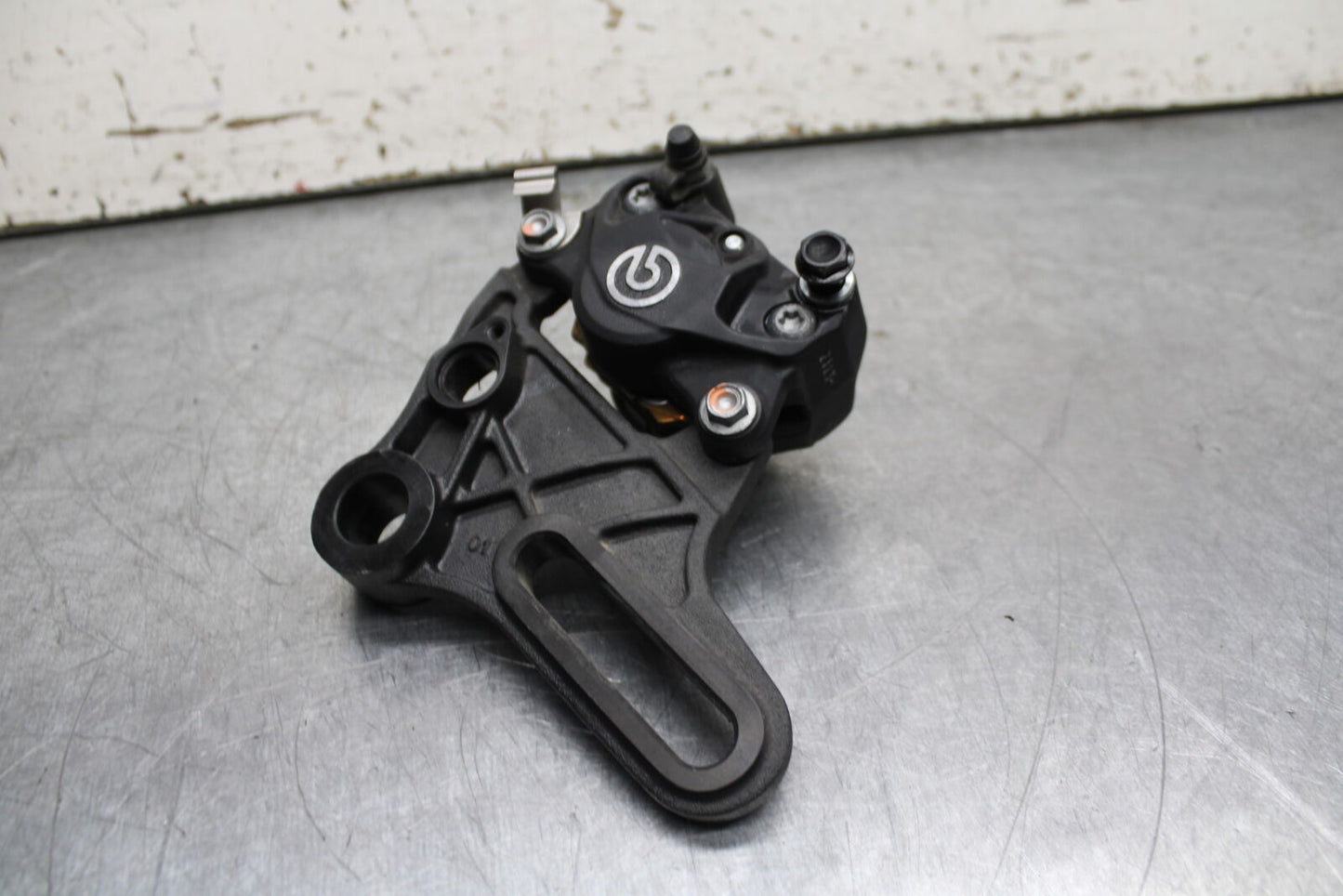 21-24 APRILIA TUONO 660 FACTORY REAR BACK BRAKE CALIPER W MOUNT BRACKET BB733