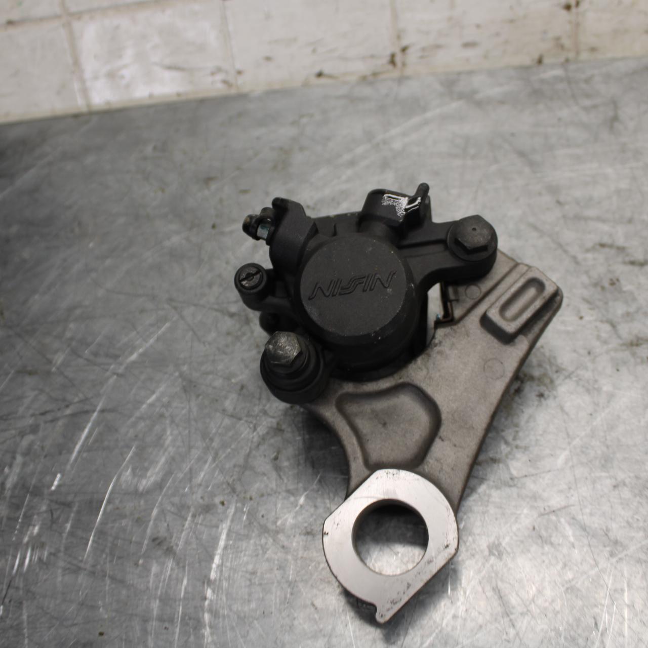 2007 Yamaha YZF R1 REAR BACK BRAKE CALIPER W MOUNT BRACKET 5VY-2580W-12-00 BB523