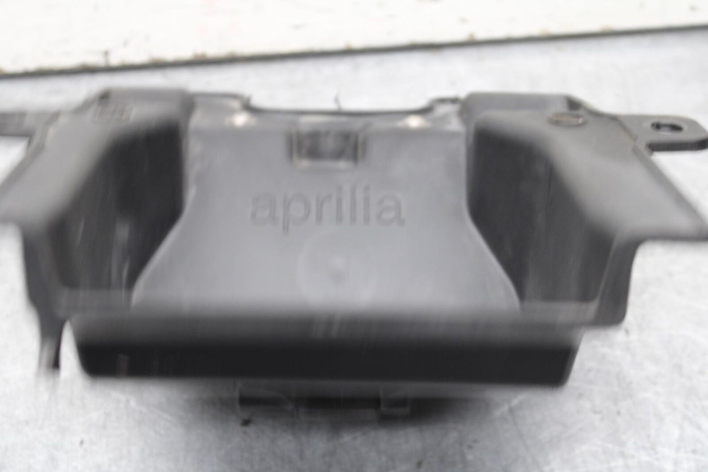 20-23 APRILIA RS660 RBATTERY TRAY PLASTIC BB643