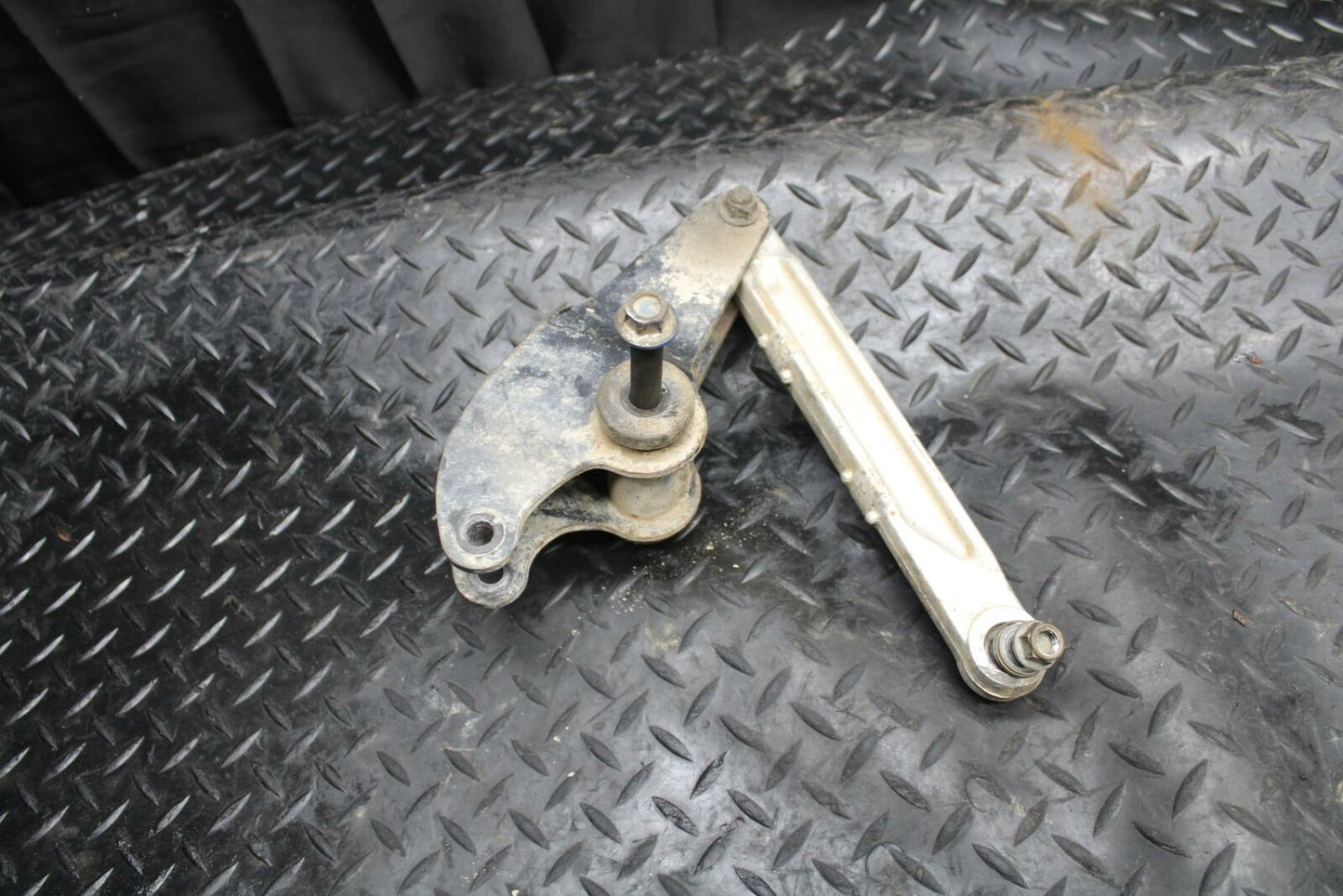 85-86 SUZUKI QUADRACER 250 REAR DOGBONE SHOCK LINKAGE LINK BB210