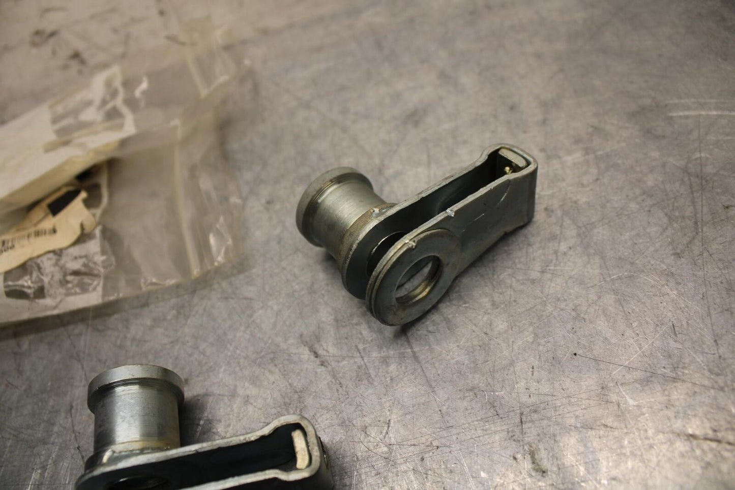 1978 Suzuki PE175 SWINGARM CHAIN TENSIONER BRACKETS 61410-41500 BB33
