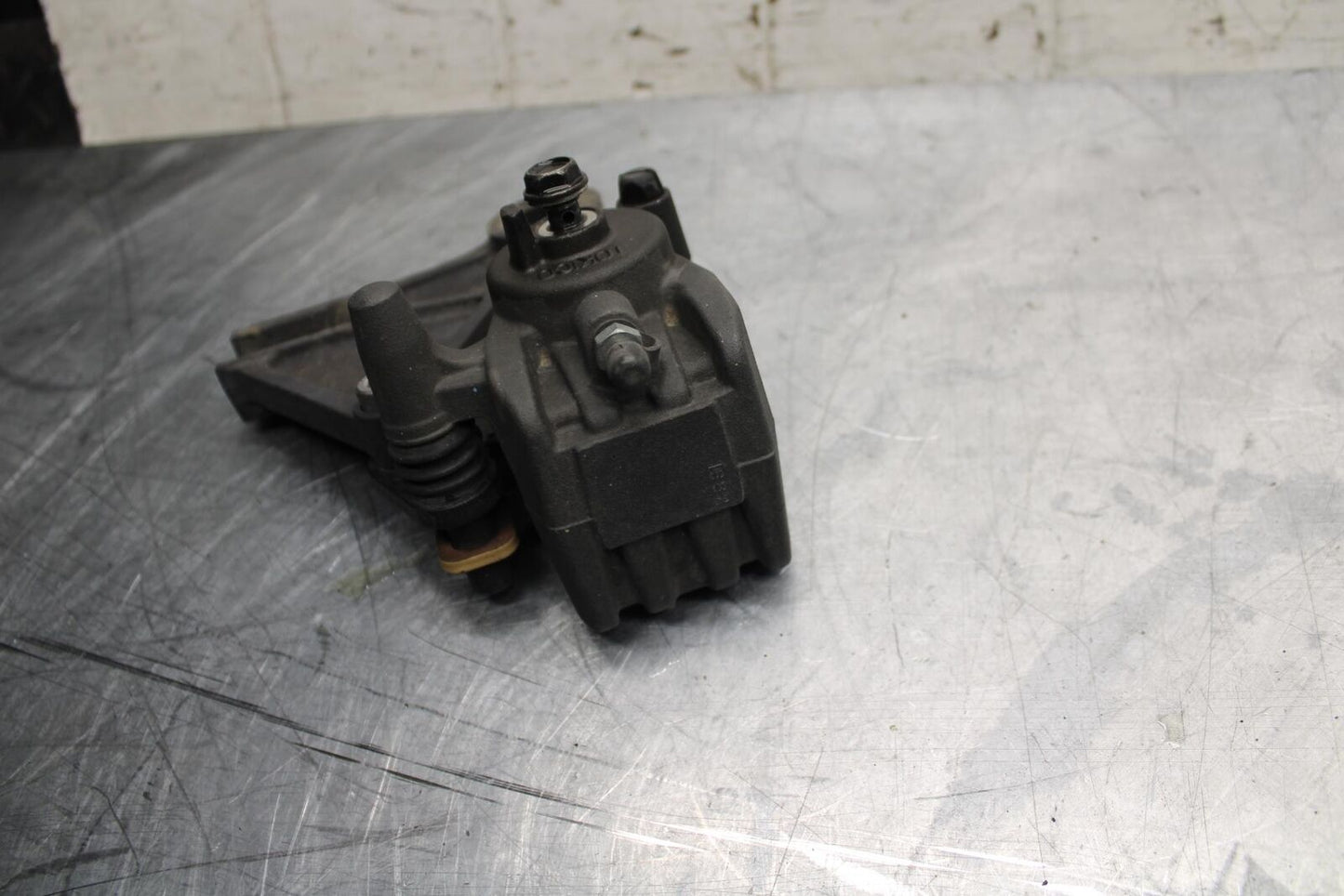 11 KAWASAKI NINJA 650 ER EX 650 REAR BACK BRAKE CALIPER W MOUNT BRACKET BB503