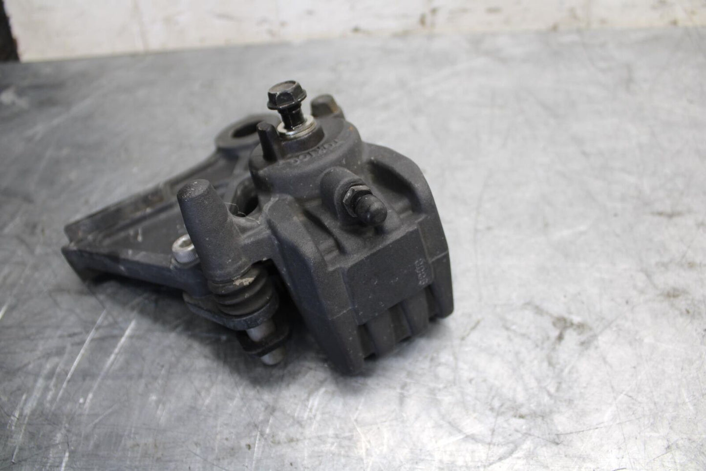 2008 Kawasaki Ninja ZX10R ZX1000E REAR BACK BRAKE CALIPER W MOUNT BRACKET BB524