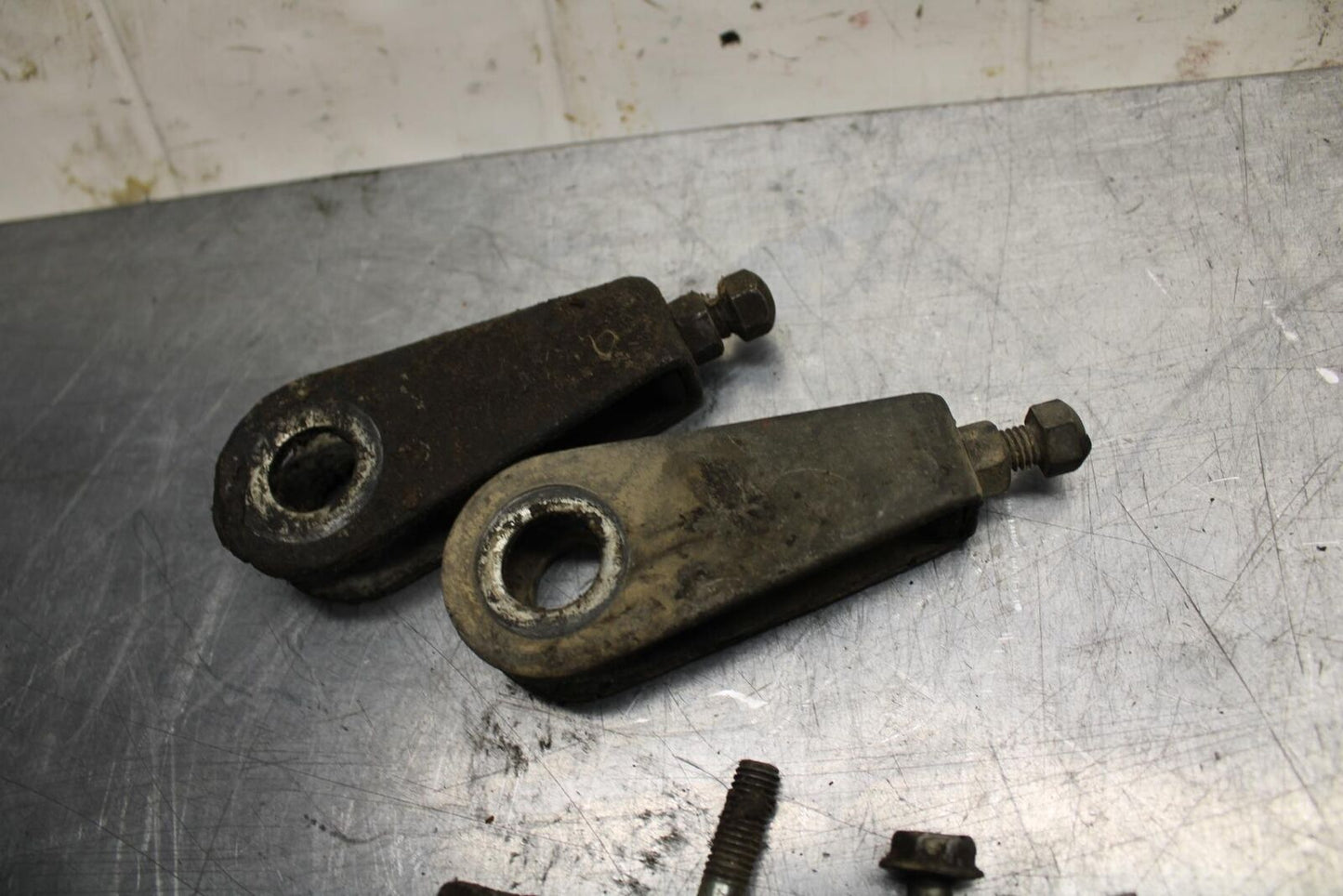 75 SUZUKI GT 550 SWINGARM CHAIN TENSIONER ADJUSTMENT BRACKETS BB72