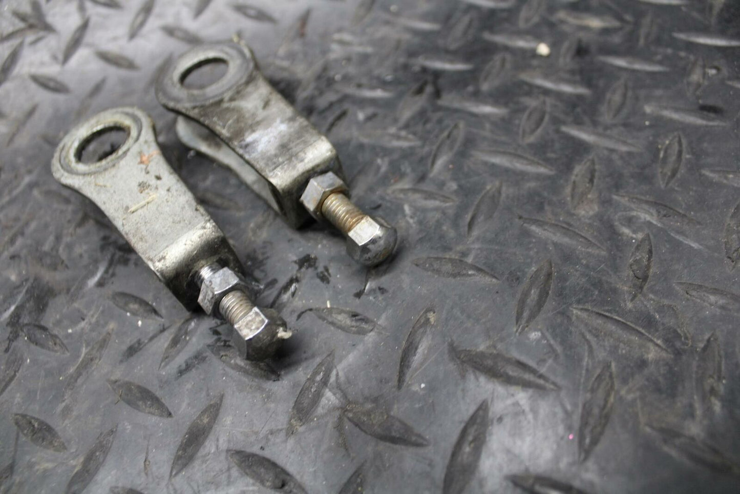 86 SUZUKI GS750ES SWINGARM CHAIN TENSIONER ADJUSTMENT BRACKETS BB233