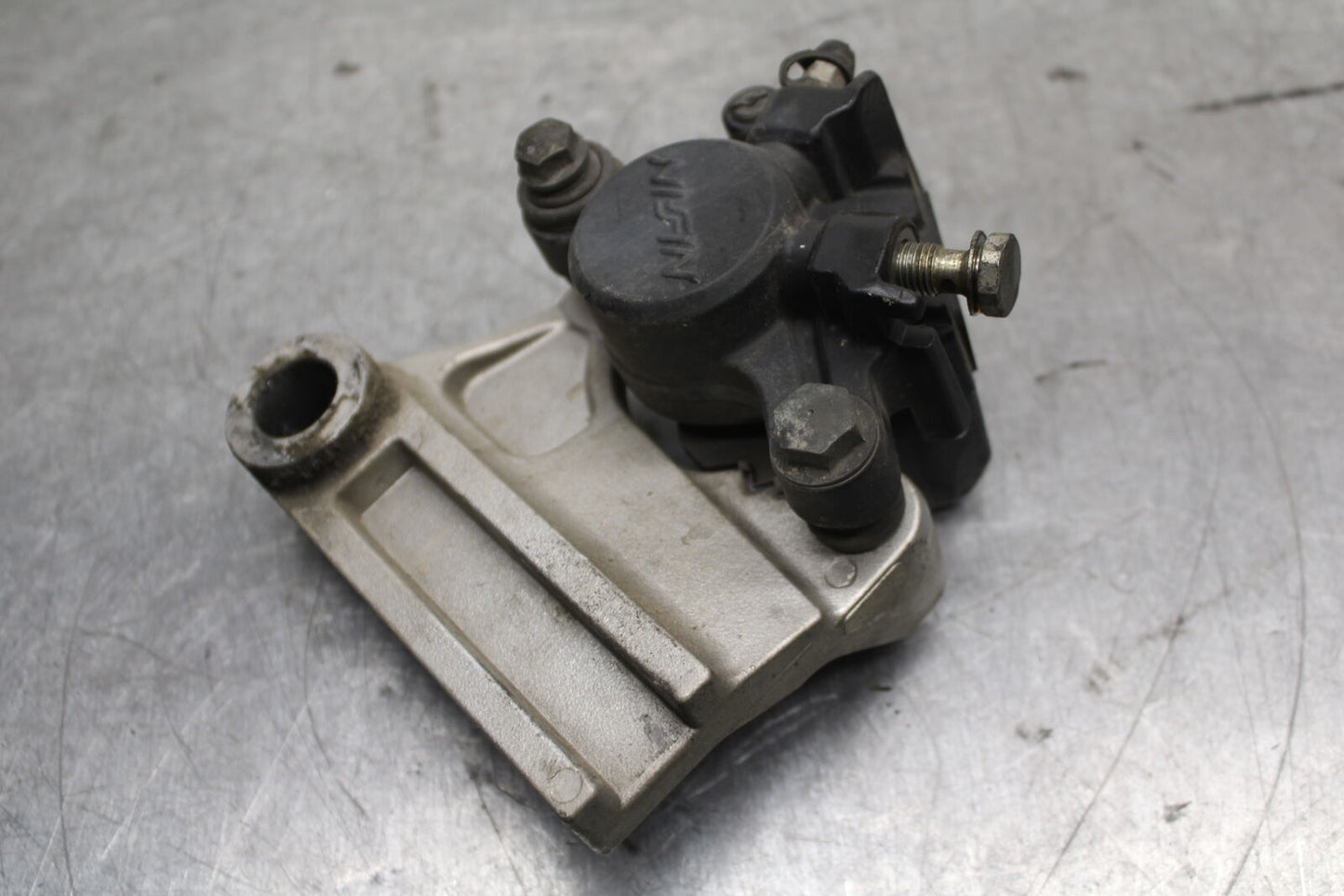 03-04 TRIUMPH DAYTONA 600 REAR BACK BRAKE CALIPER W MOUNT BRACKET BB745