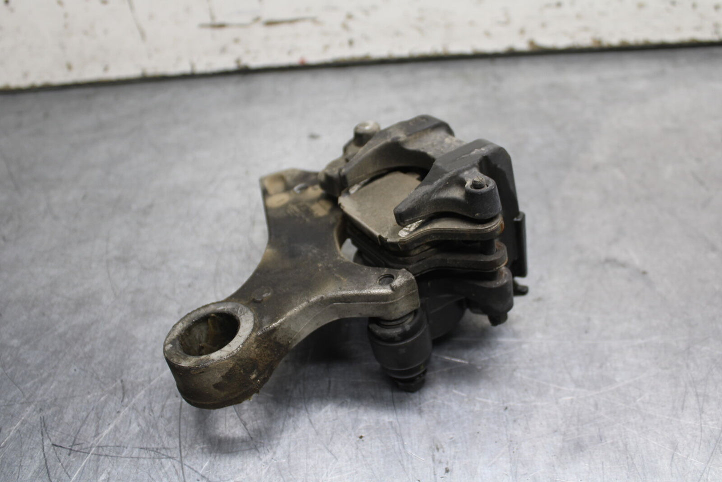 05-06 HONDA CBR600RR REAR BACK BRAKE CALIPER W MOUNT BRACKET BB739