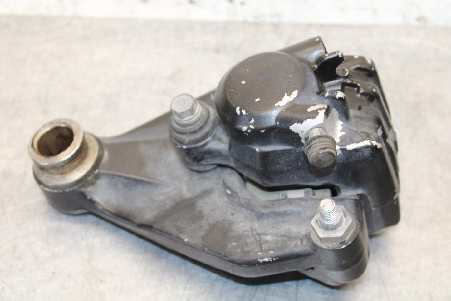 1977 Yamaha XS750 REAR BACK BRAKE CALIPER W MOUNT BRACKET BB554