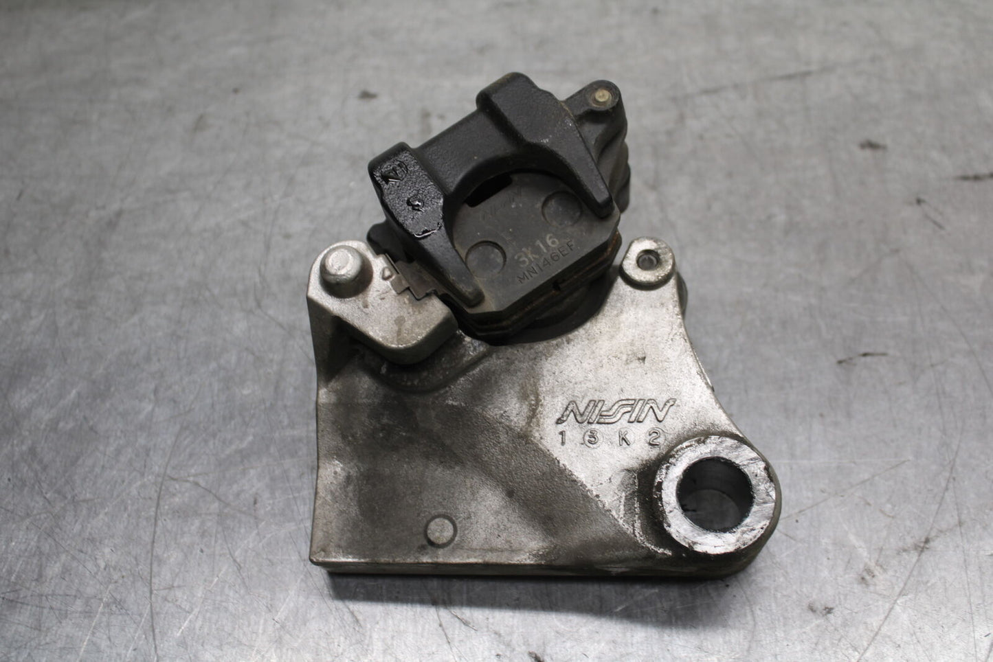 03-04 TRIUMPH DAYTONA 600 REAR BACK BRAKE CALIPER W MOUNT BRACKET BB745