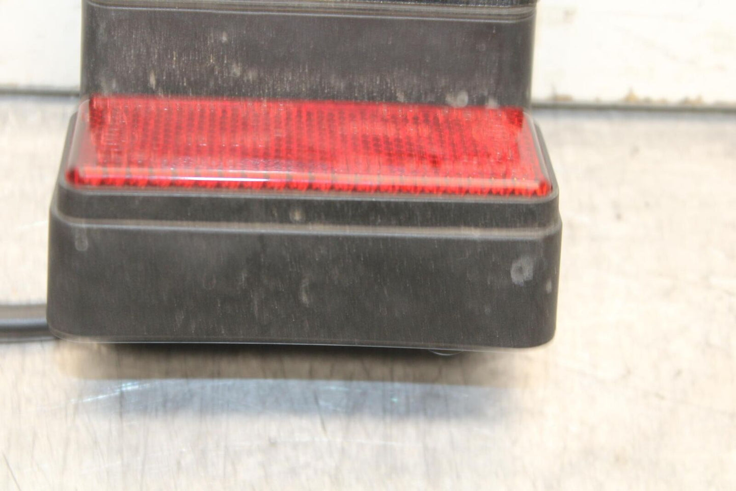 11-19 HONDA CBR125R LICENSE PLATE LIGHT BB105