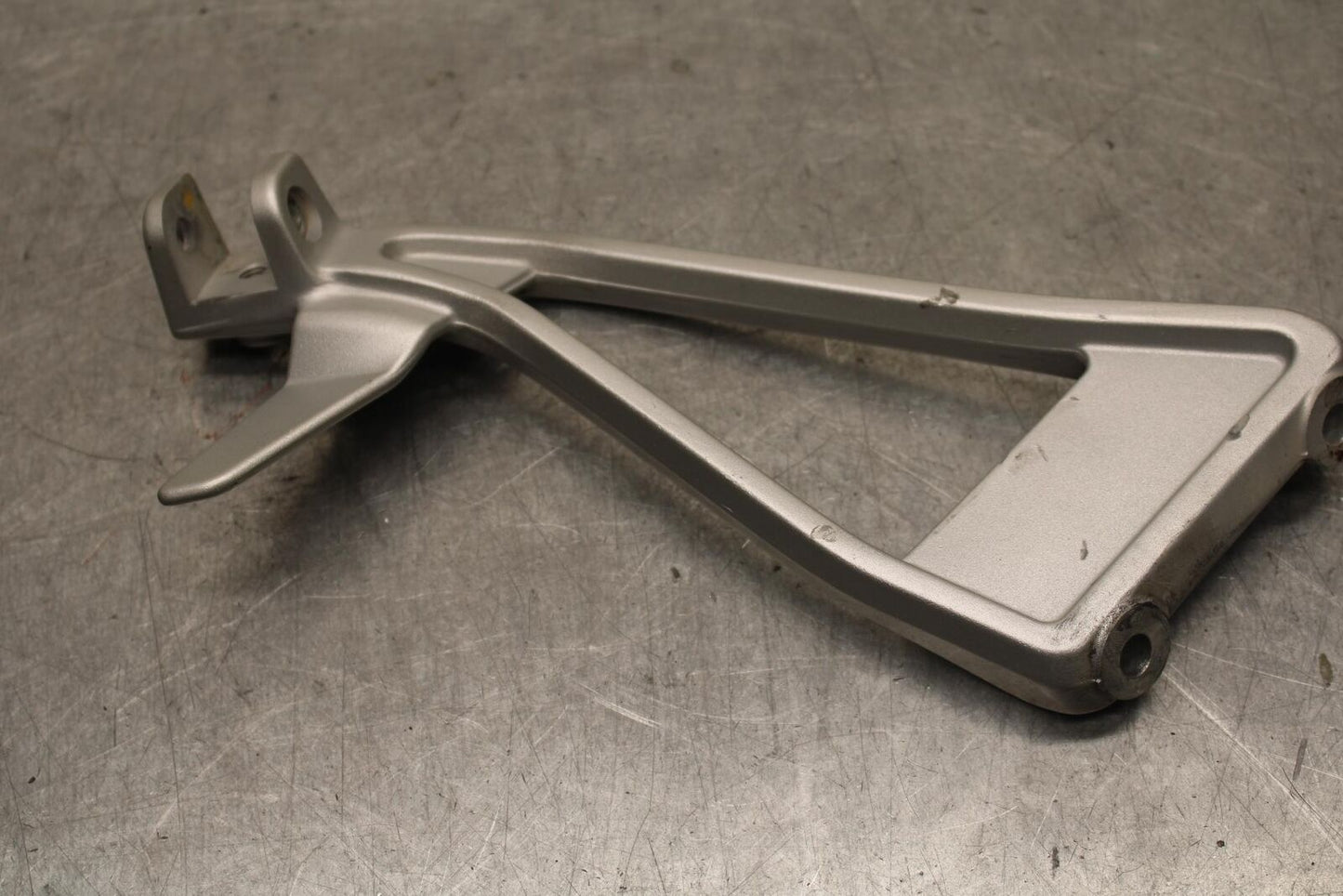 20-23 APRILIA RS660 LEFT PASSENGER FOOT PEG BRACKET MOUNT BB643