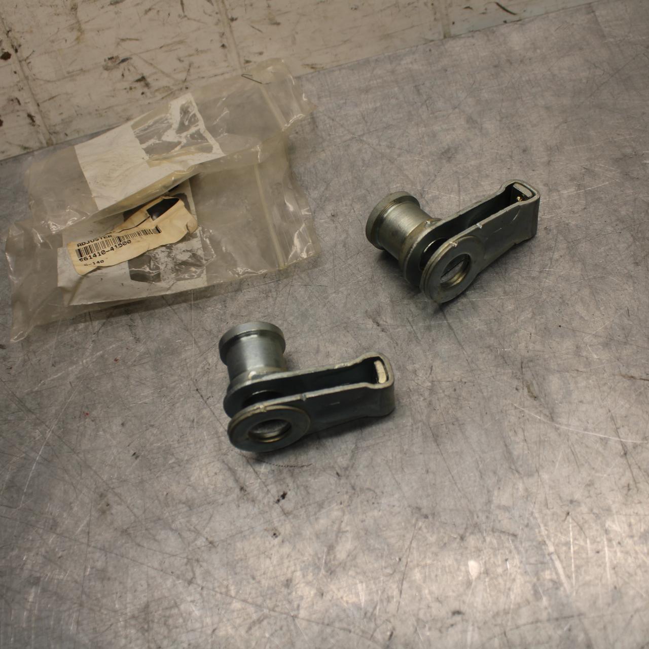 1978 Suzuki PE175 SWINGARM CHAIN TENSIONER BRACKETS 61410-41500 BB33