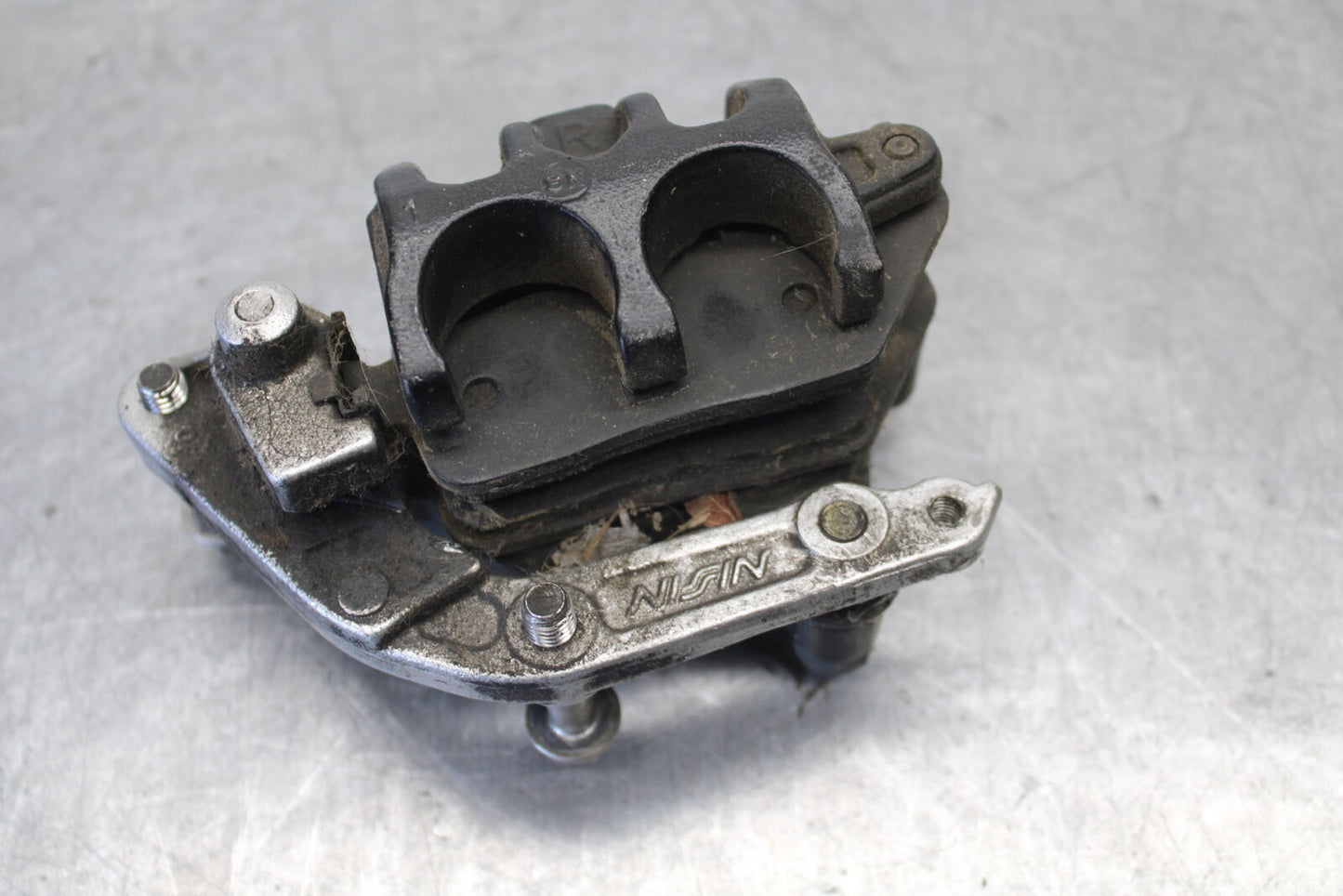 01-06 TRIUMPH TIGER 955I REAR BACK BRAKE CALIPER W MOUNT BRACKET BB693