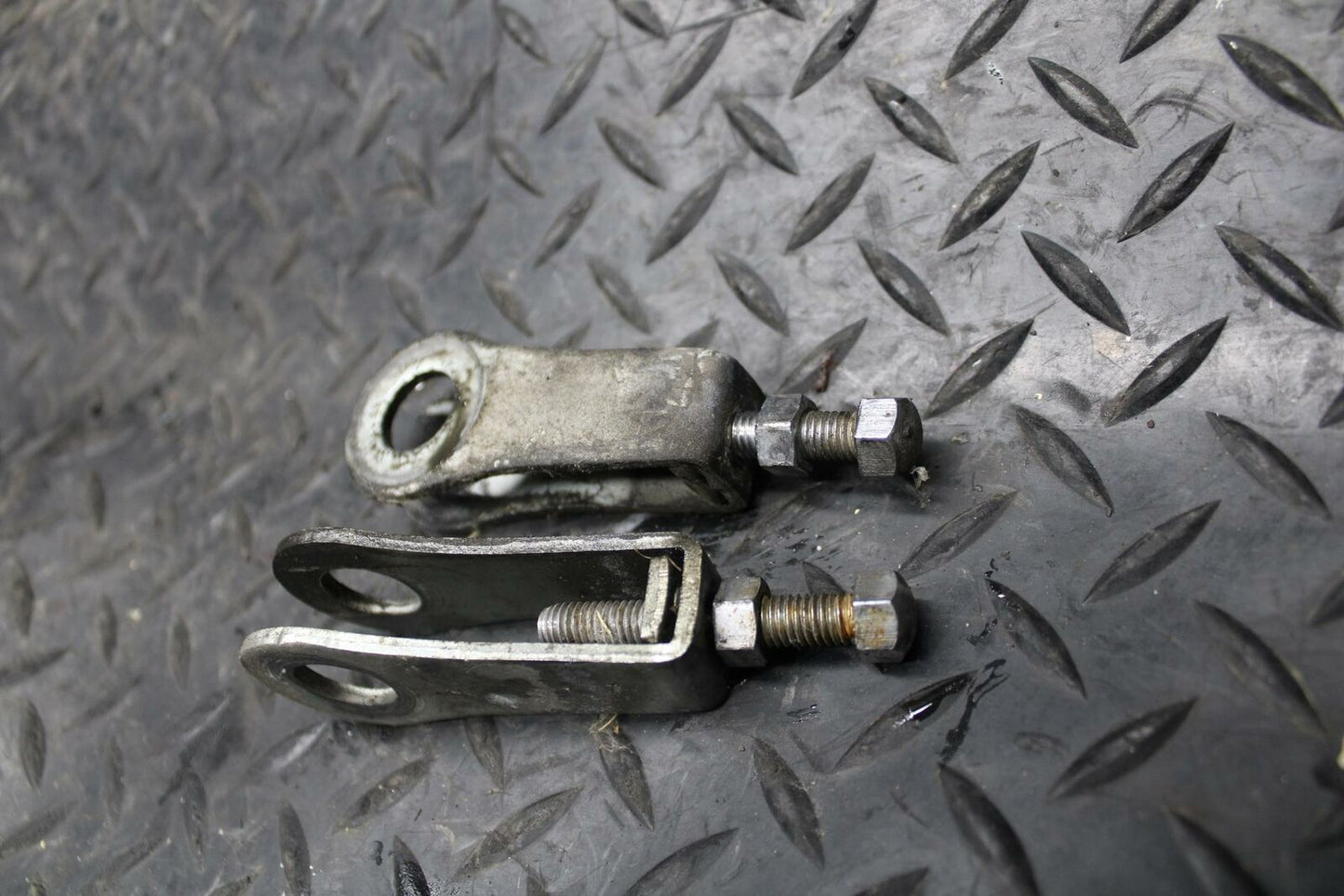 86 SUZUKI GS750ES SWINGARM CHAIN TENSIONER ADJUSTMENT BRACKETS BB233