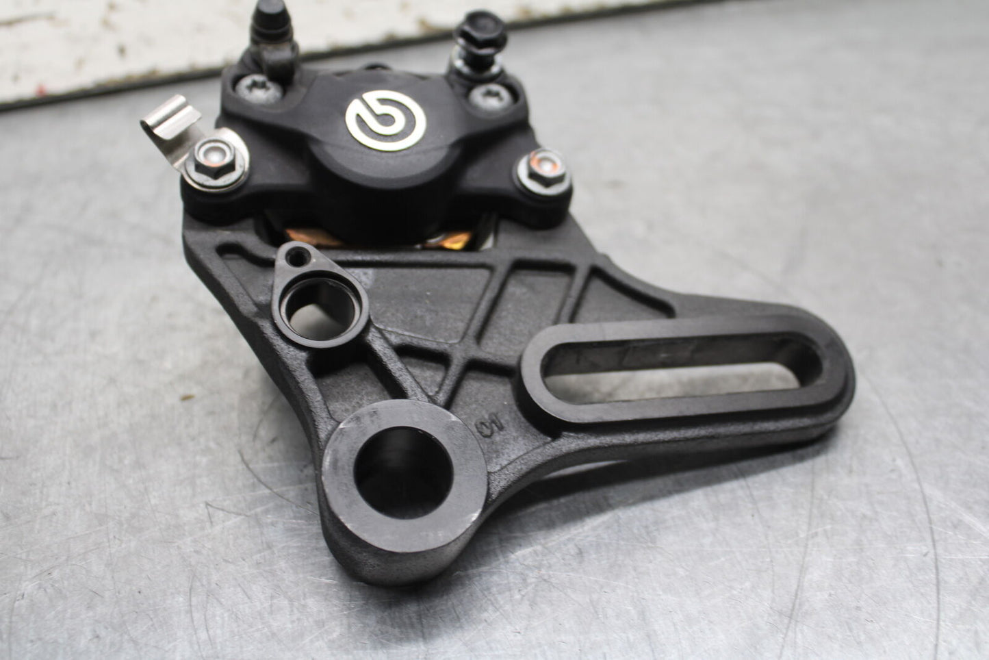 21-24 APRILIA TUONO 660 FACTORY REAR BACK BRAKE CALIPER W MOUNT BRACKET BB733