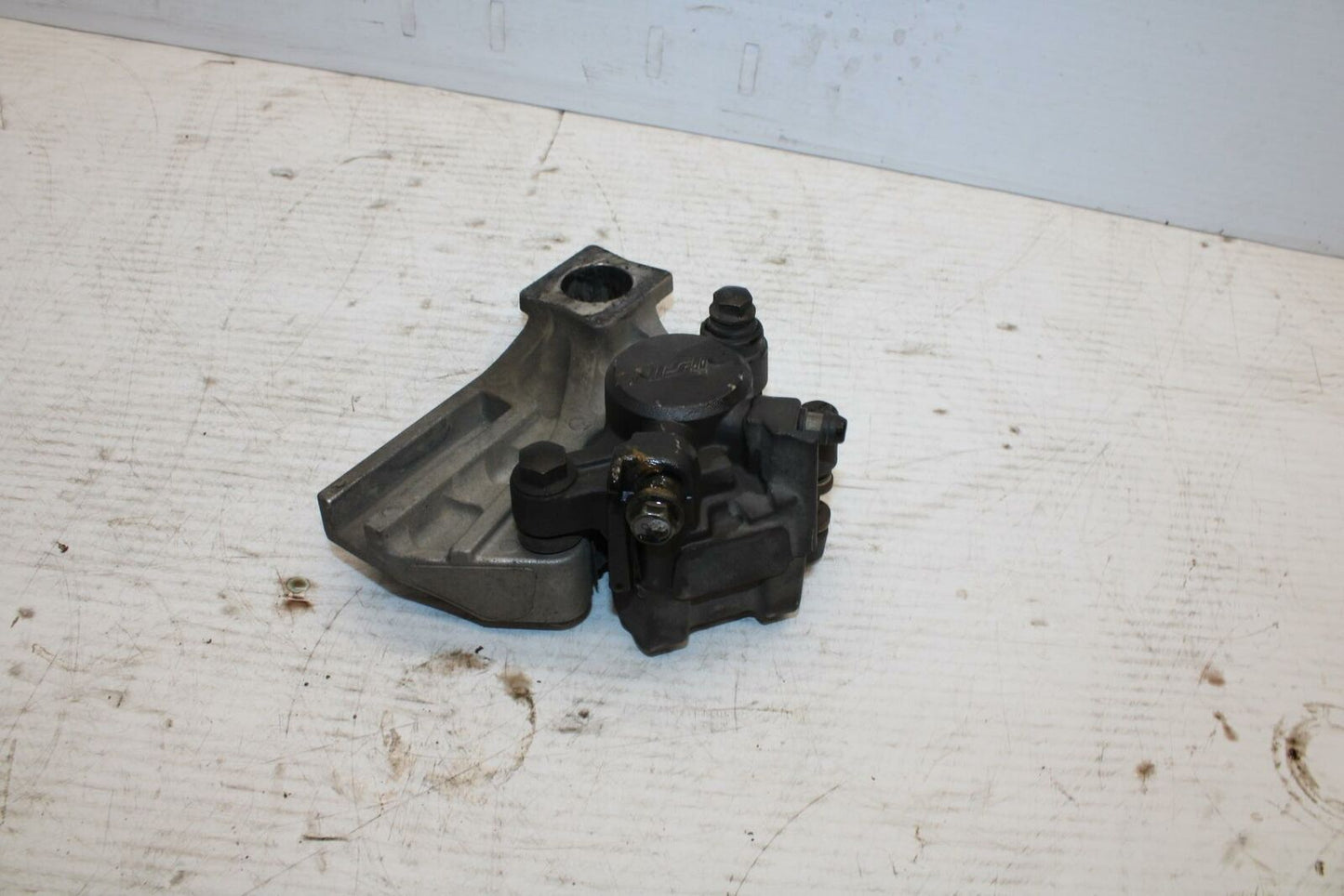 03-05 SUZUKI SV1000 REAR BACK BRAKE CALIPER W MOUNT BRACKET BB296