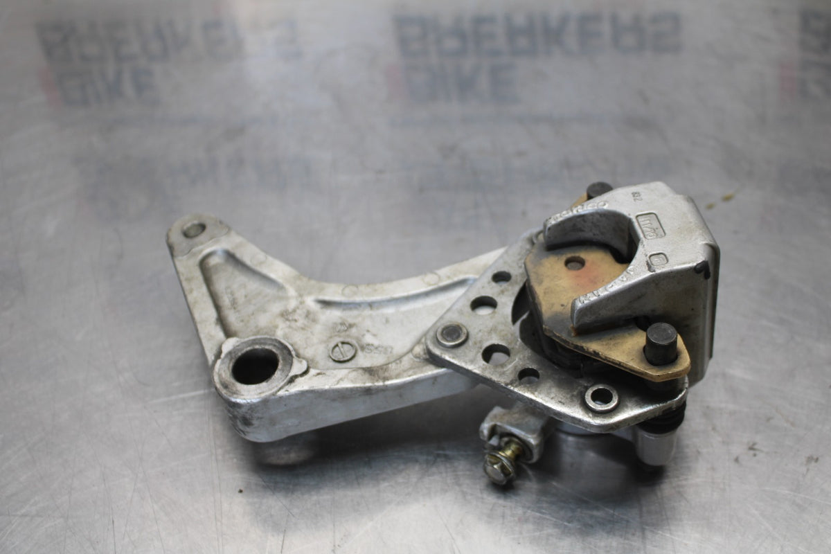 03-08 KAWASAKI VULCAN 1600 REAR BACK BRAKE CALIPER W MOUNT BRACKET BB196
