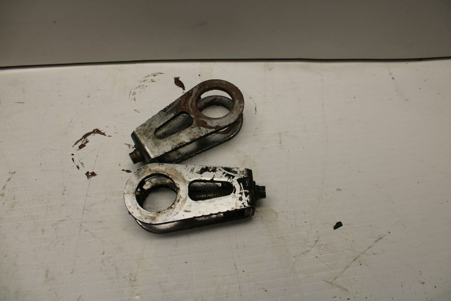 03-04 HONDA CBR600RR SWINGARM CHAIN TENSIONER ADJUSTMENT BRACKETS BB253