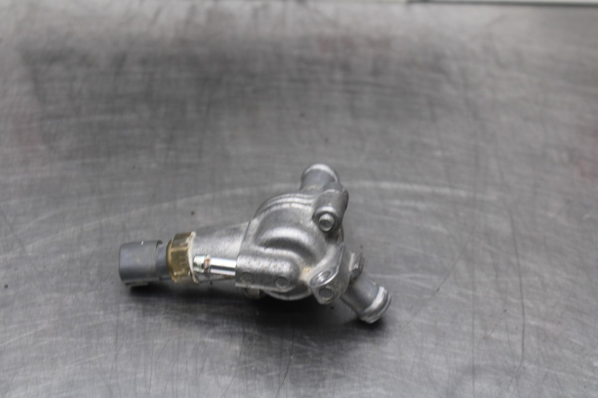 08 HONDA CBR125R THERMOSTAT W HOUSING ASSEMBLY BB804