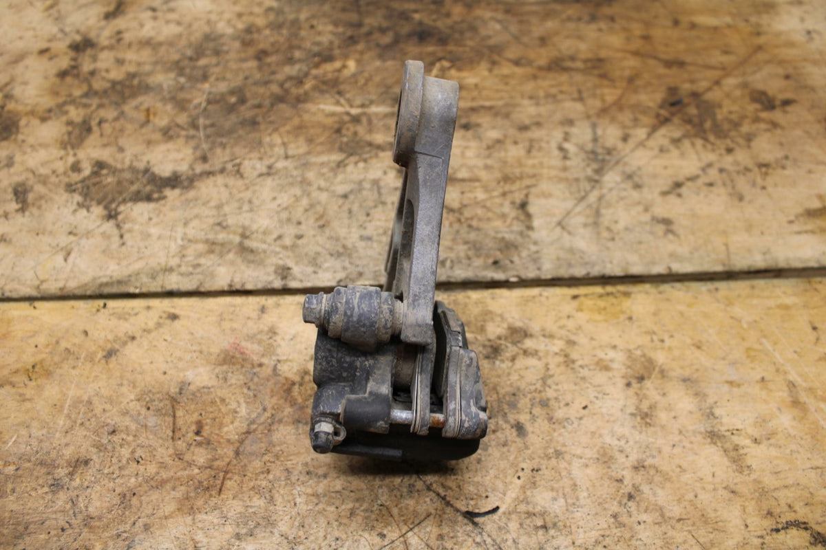 07-11 SUZUKI VSTROM 650 REAR BACK BRAKE CALIPER W MOUNT BRACKET