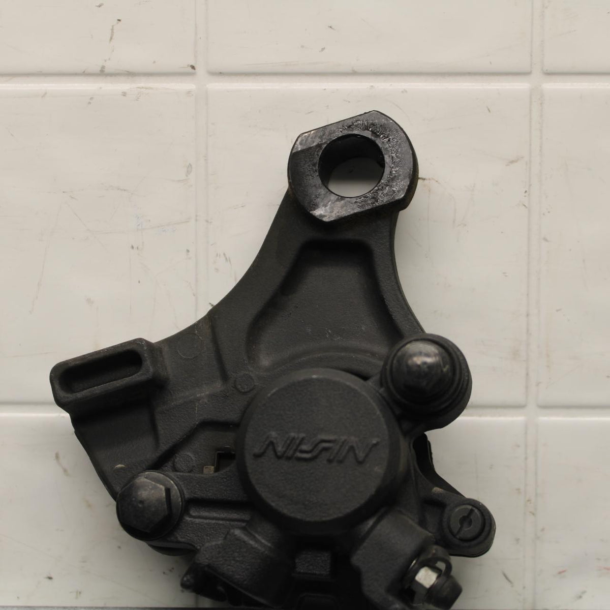 2009 Triumph Daytona 675 REAR BACK BRAKE CALIPER W MOUNT BRACKET BB584