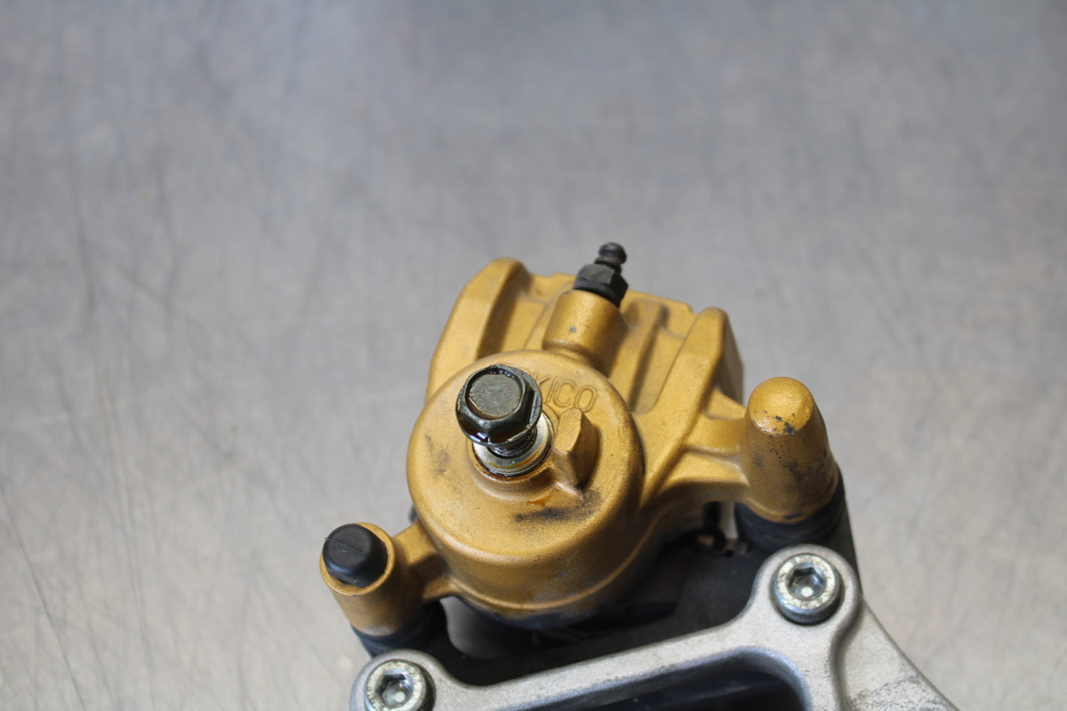 03-06 KAWASAKI Z1000 REAR BACK BRAKE CALIPER W MOUNT BRACKET BB164