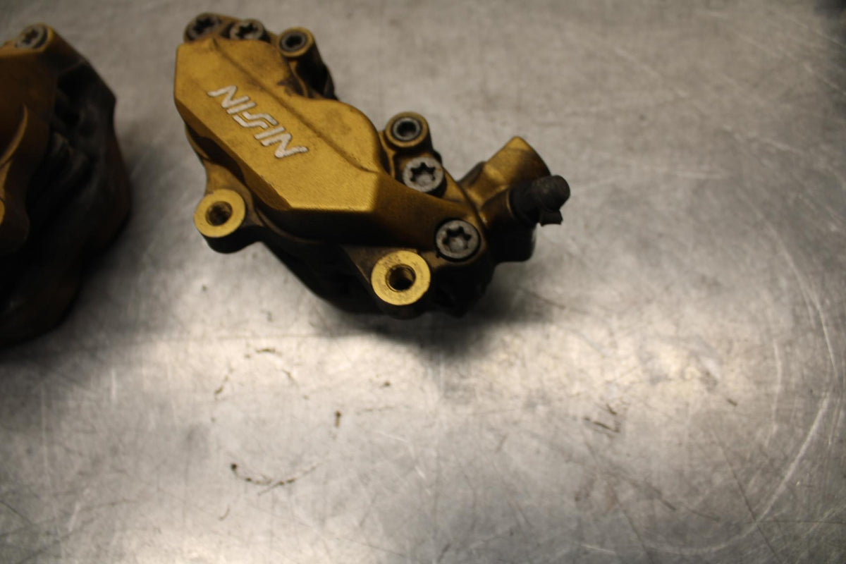 03-04 HONDA CBR600RR RIGHT LEFT FRONT BRAKE CALIPER SET PAIR CALIPERS BB614