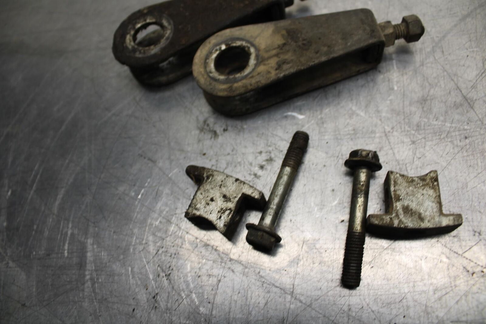 75 SUZUKI GT 550 SWINGARM CHAIN TENSIONER ADJUSTMENT BRACKETS  BB72