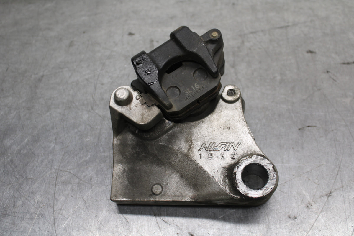 03-04 TRIUMPH DAYTONA 600 REAR BACK BRAKE CALIPER W MOUNT BRACKET BB745
