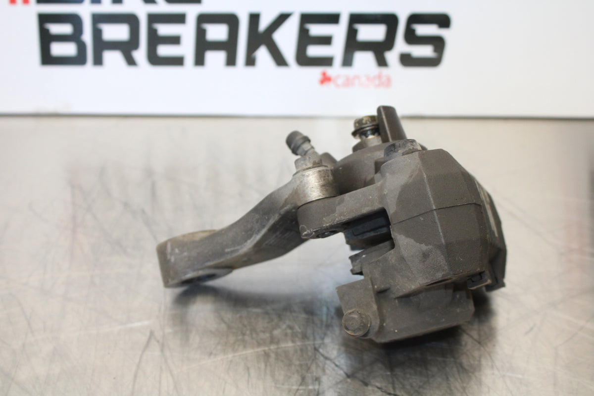 00 SUZUKI SV650 REAR BACK BRAKE CALIPER W MOUNT BRACKET BB156