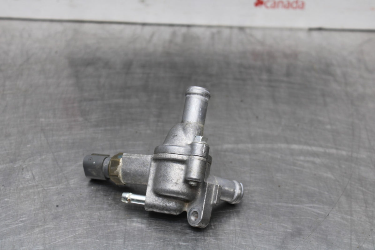 08 HONDA CBR125R THERMOSTAT W HOUSING ASSEMBLY BB804