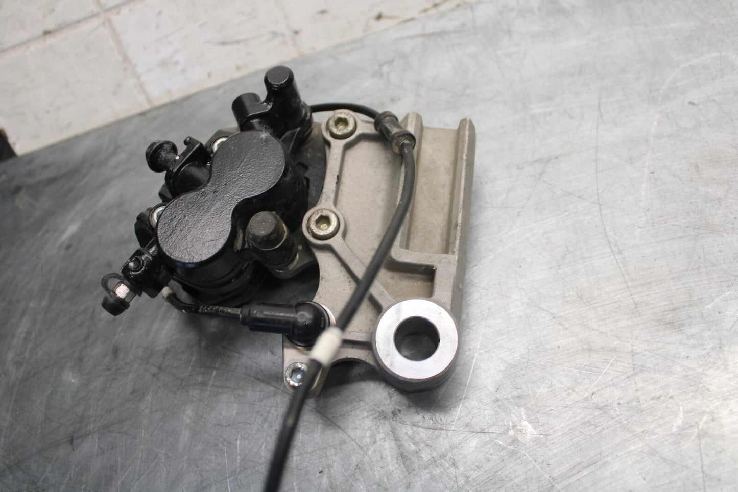 2015 Kawasaki Ninja 300 EX300B ABS REAR BACK BRAKE CALIPER W MOUNT BRACKET BB518