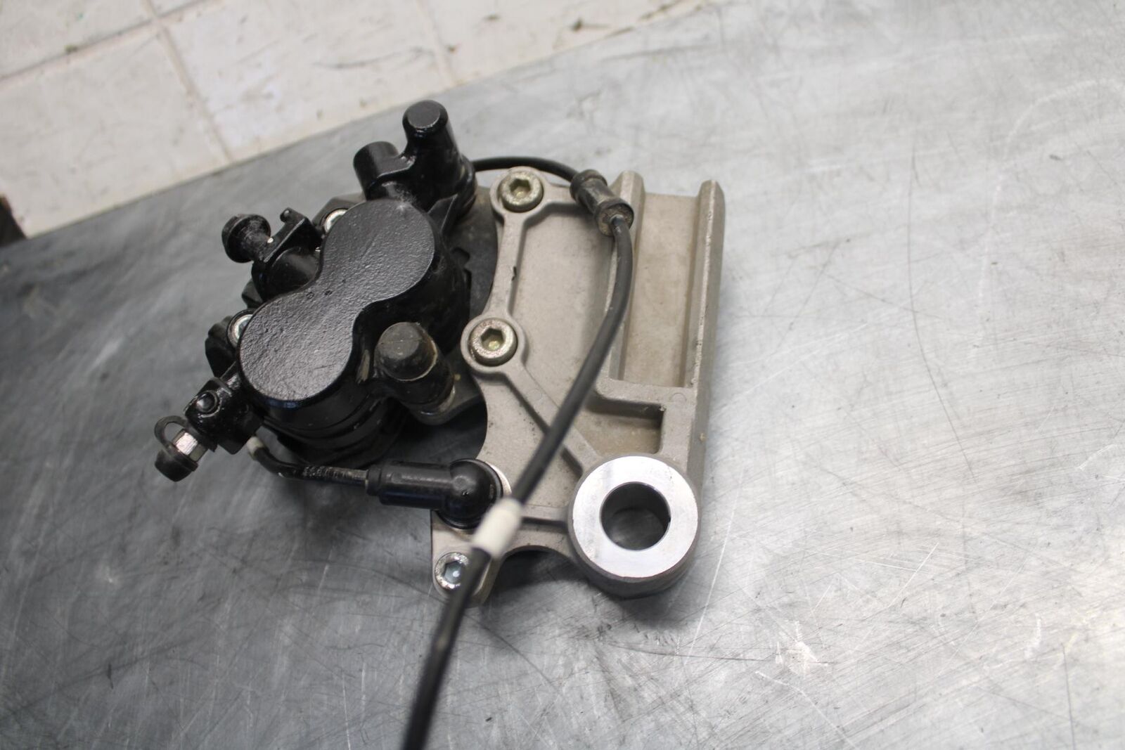 2015 Kawasaki Ninja 300 EX300B ABS REAR BACK BRAKE CALIPER W MOUNT BRACKET BB518