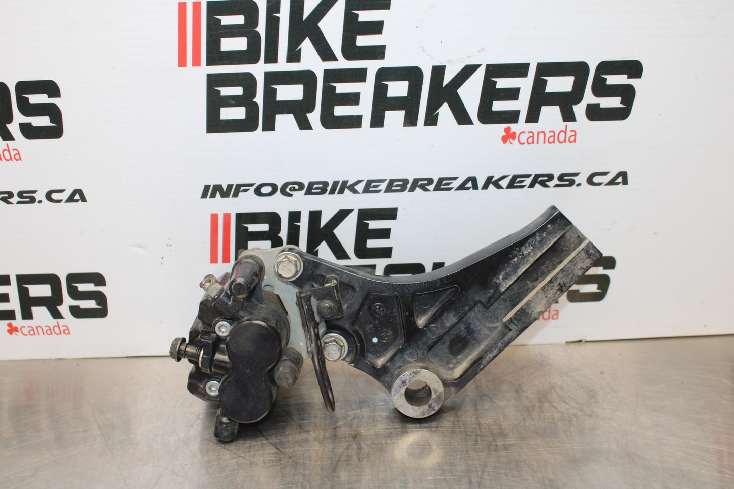 08-18 KAWASAKI KLR650 REAR BACK BRAKE CALIPER W MOUNT BRACKET BB183