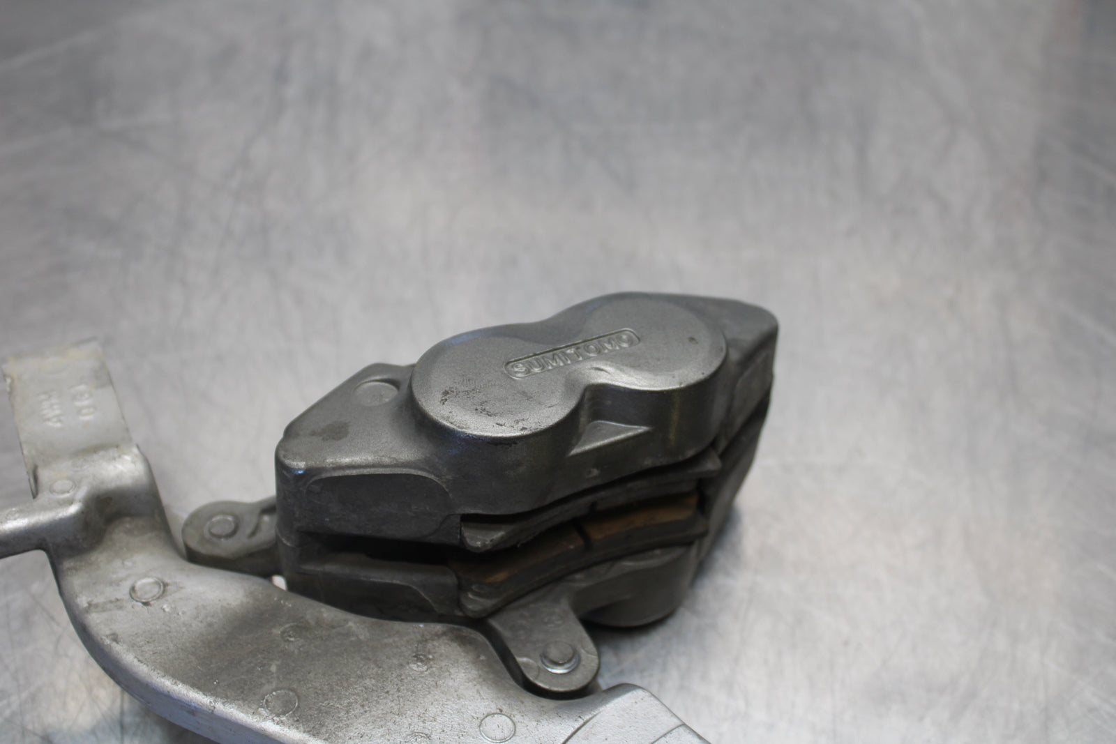 04 YAMAHA ROAD STAR XV1700A REAR BACK BRAKE CALIPER W MOUNT BRACKET BB155