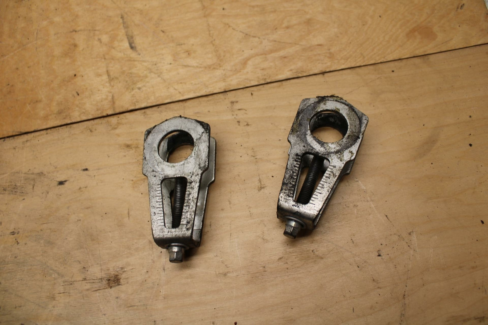 08-14 DUCATI MONSTER 696 SWINGARM CHAIN TENSIONER ADJUSTMENT BRACKETS  BB324