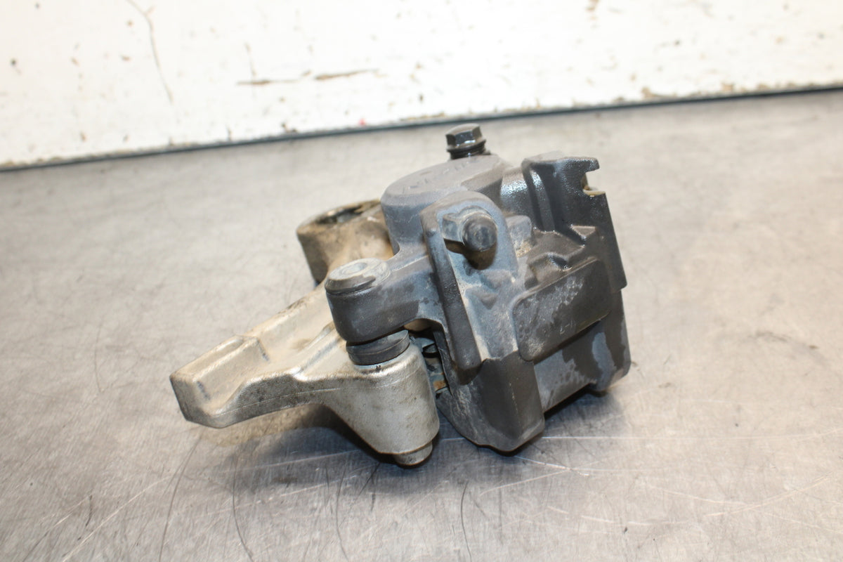05-06 HONDA CBR600RR REAR BACK BRAKE CALIPER W MOUNT BRACKET BB739